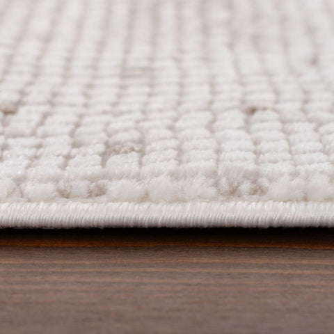White textured carmel cream beige dots rug with woven raised pattern and neatly finished edge for cozy spaces