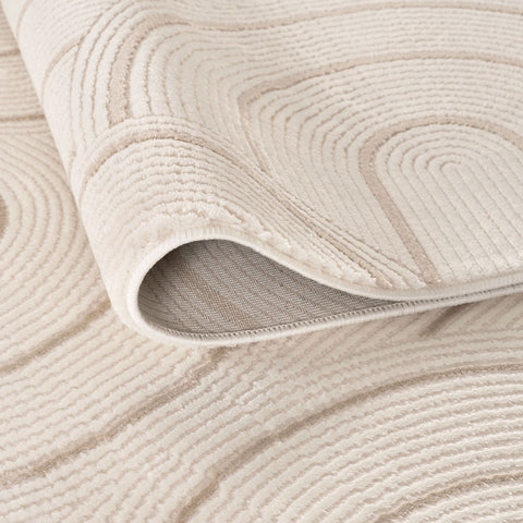Beige geometric rug with a soft plush pile and textured wave-like pattern perfect for cozy spaces
