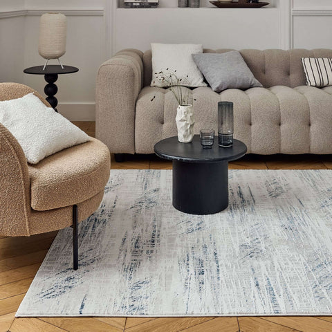 Modern abstract rug carmel cream-blue with soft white and gray tones and textured brushstroke design