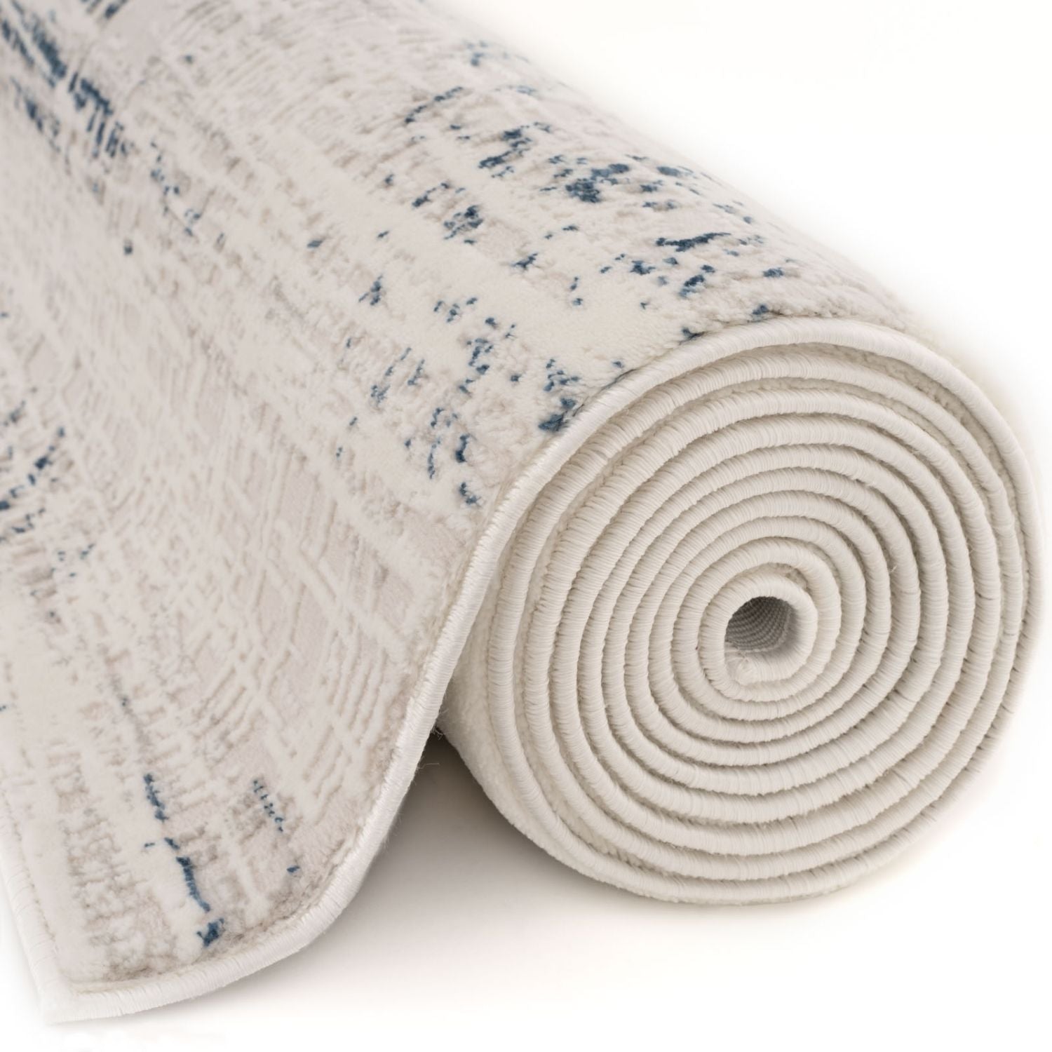 A rolled carmel cream-blue abstract rug with a subtle blue pattern and textured surface perfect for living rooms