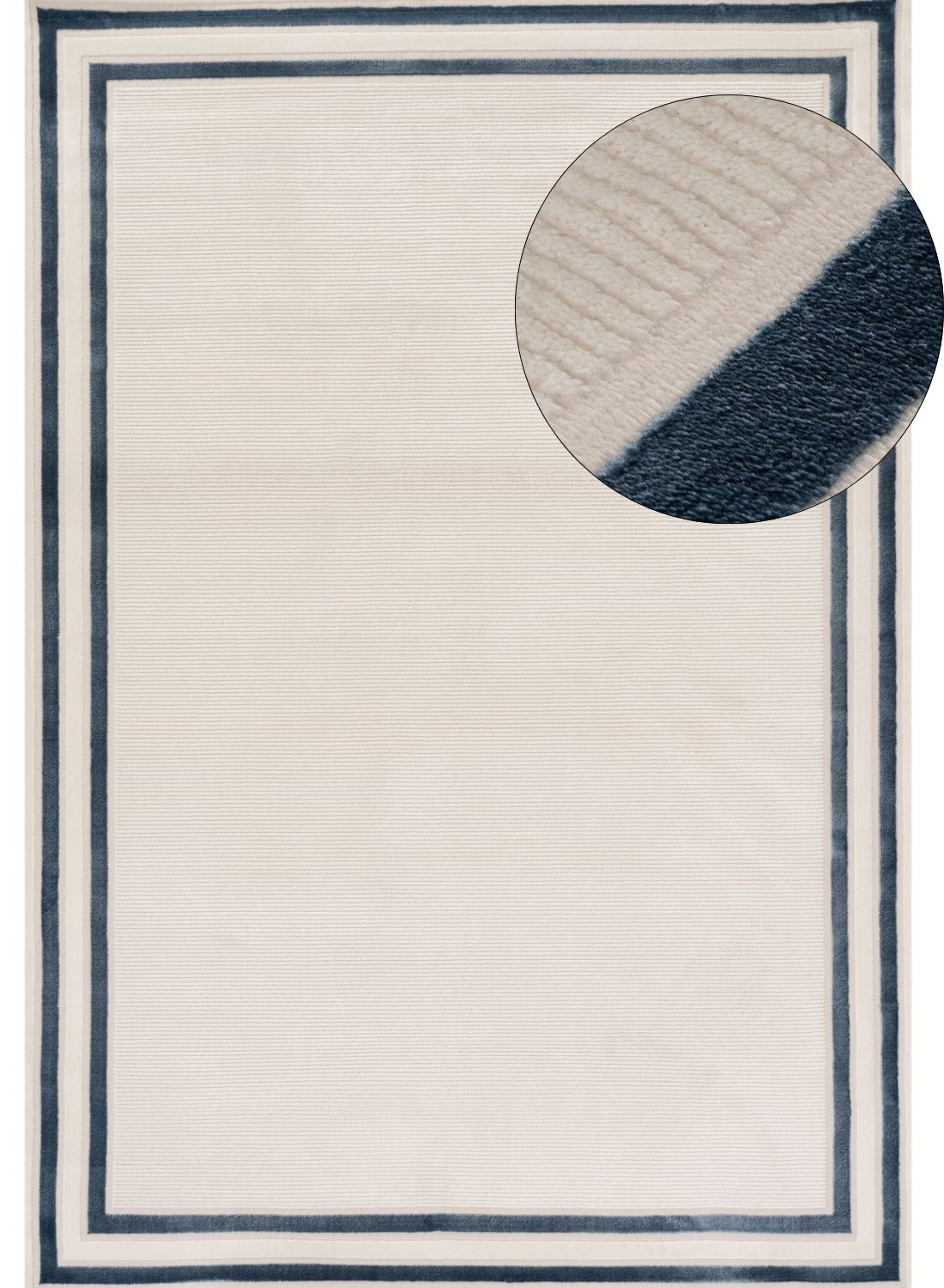 Cream-colored bordered rug with navy blue trim and textured ribbed weave perfect for cozy spaces