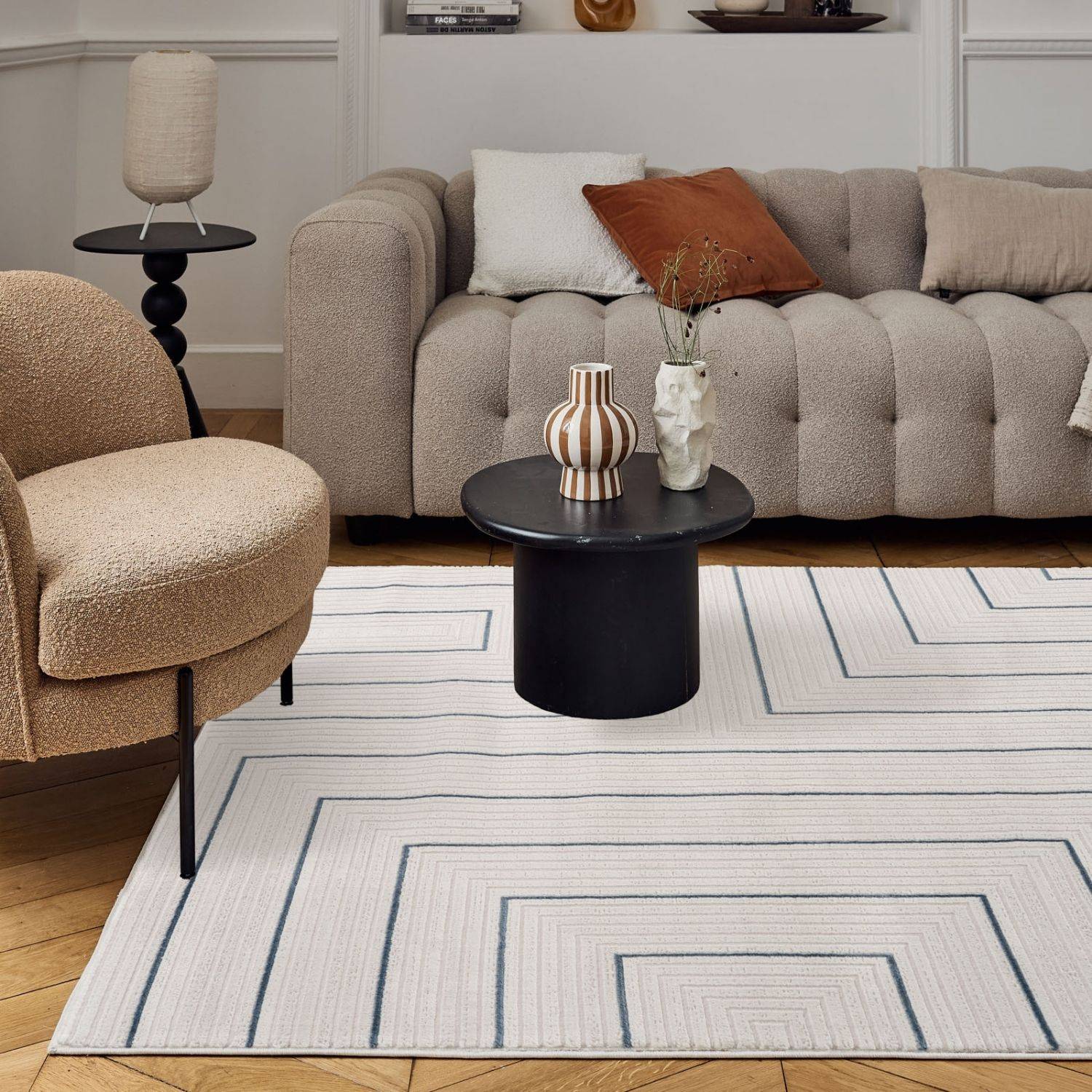 Modern geometric rug with a white base and blue geometric concentric rectangular lines carmel cream-blue 6040