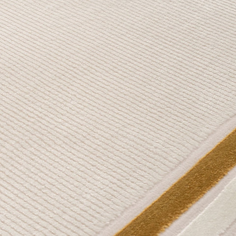 Cream-colored textured rug with subtle gold border perfect as a stylish bordered rug for any room
