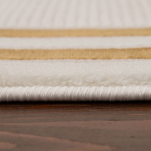 Carmel cream gold bordered rug with white and gold stripes and a plush textured surface perfect for cozy spaces