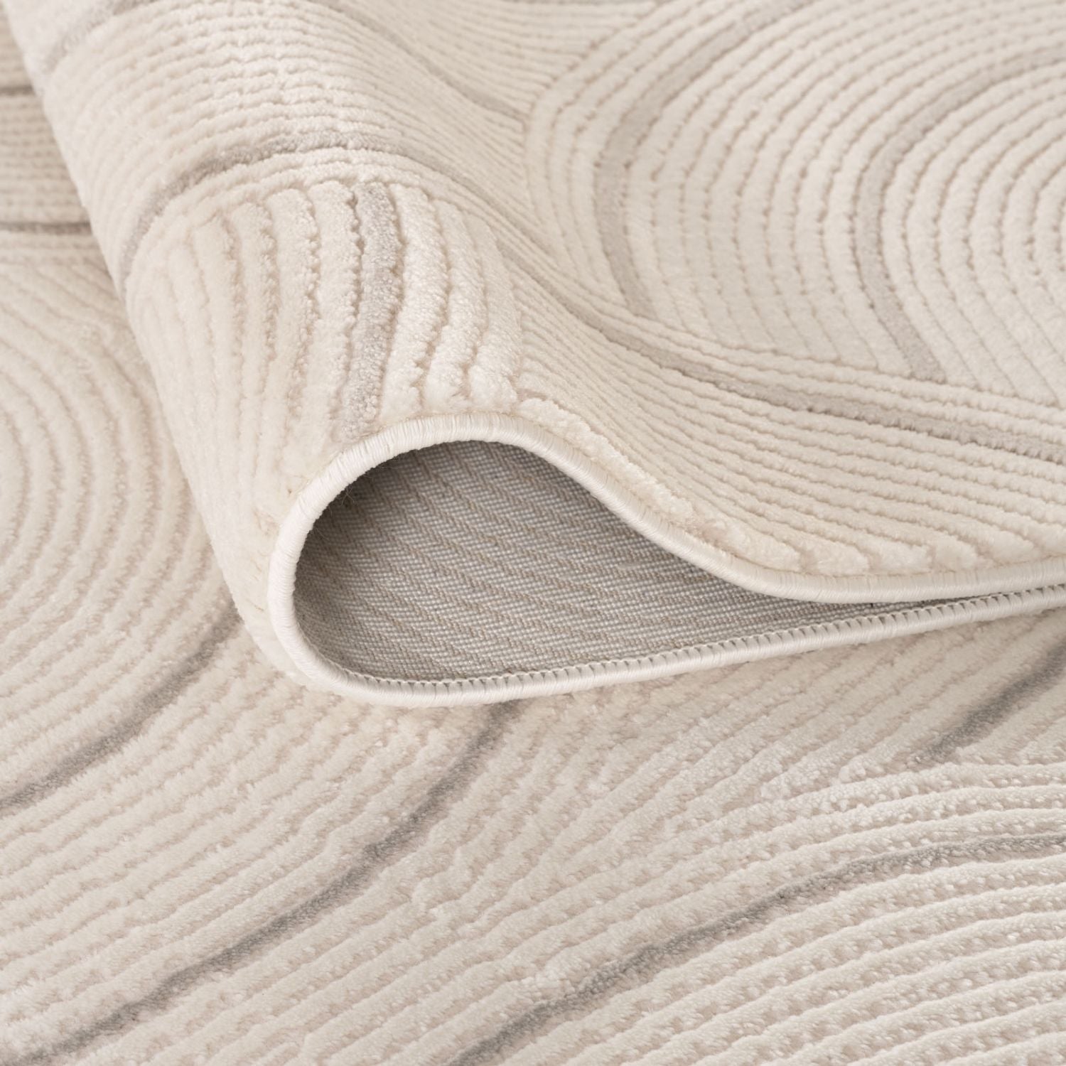 Beige geometric rug carmel cream-grey with soft textured surface and subtle wave patterns perfect for cozy spaces