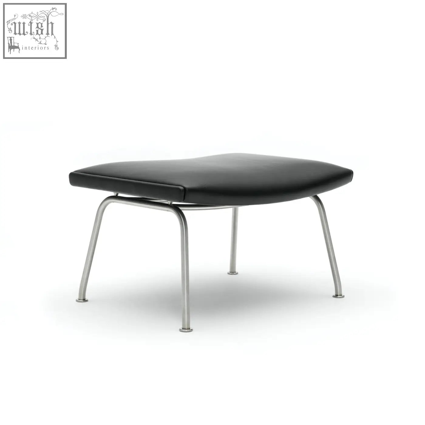 Black leather ottoman with sleek chrome legs featuring selected high-density elastic foam for extra comfort