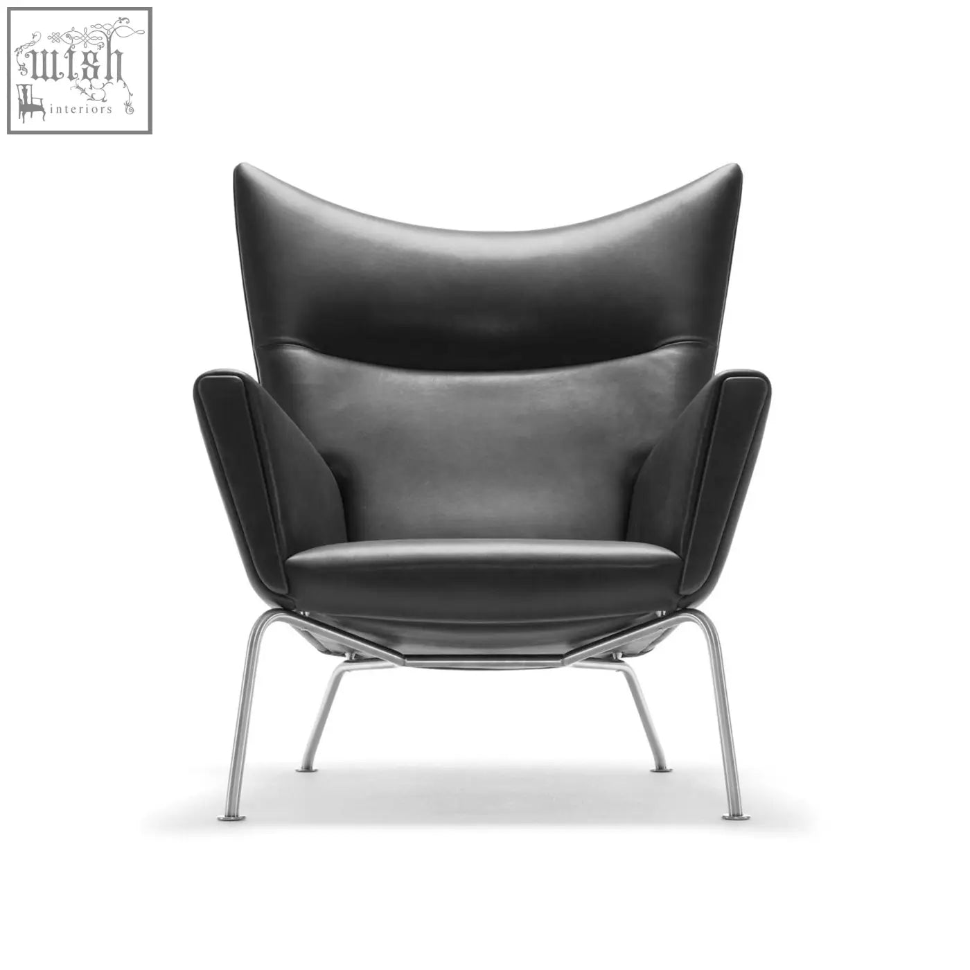 Black leather carnaby high back armchair with ottoman features sleek chrome legs and selected high-density elastic foam cushions