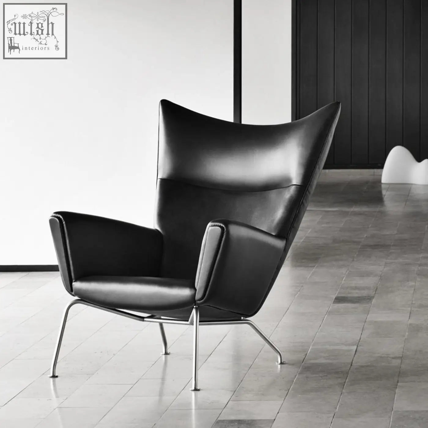 Black leather carnaby high back armchair with ottoman features selected high-density elastic foam and chrome legs