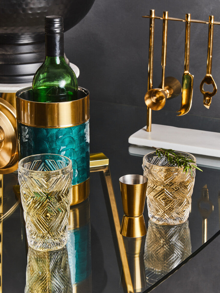 Teal and gold carolina green enamel wine cooler with a green wine bottle inside for chilling drinks