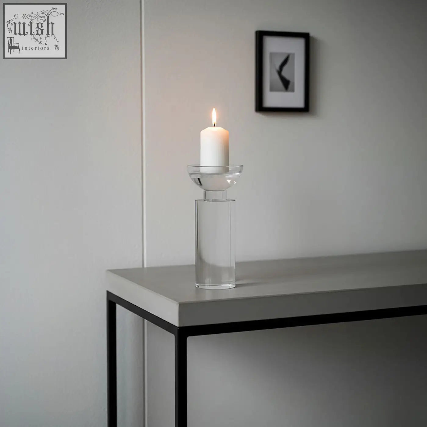 Clear glass crystal candle holder with cylindrical base and bowl top holding white pillar candle Carrie small crystal candle holder