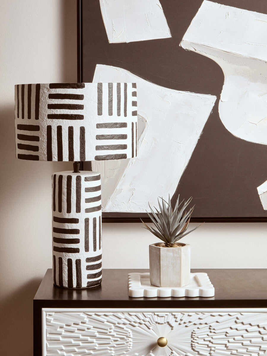 Carta black and white papier mache table lamp with geometric lines and a textured cylindrical base perfect for any room
