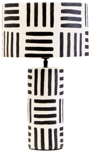 Carta black and white papier mache table lamp with geometric lines and cylindrical base with matching shade