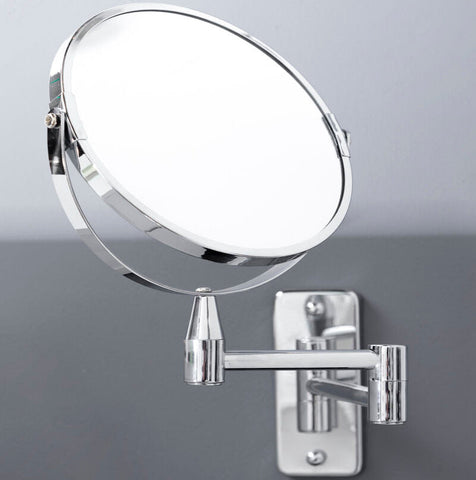 Chrome finished cassini wall mounted extending mirror with sleek articulated arm and circular reflective surface