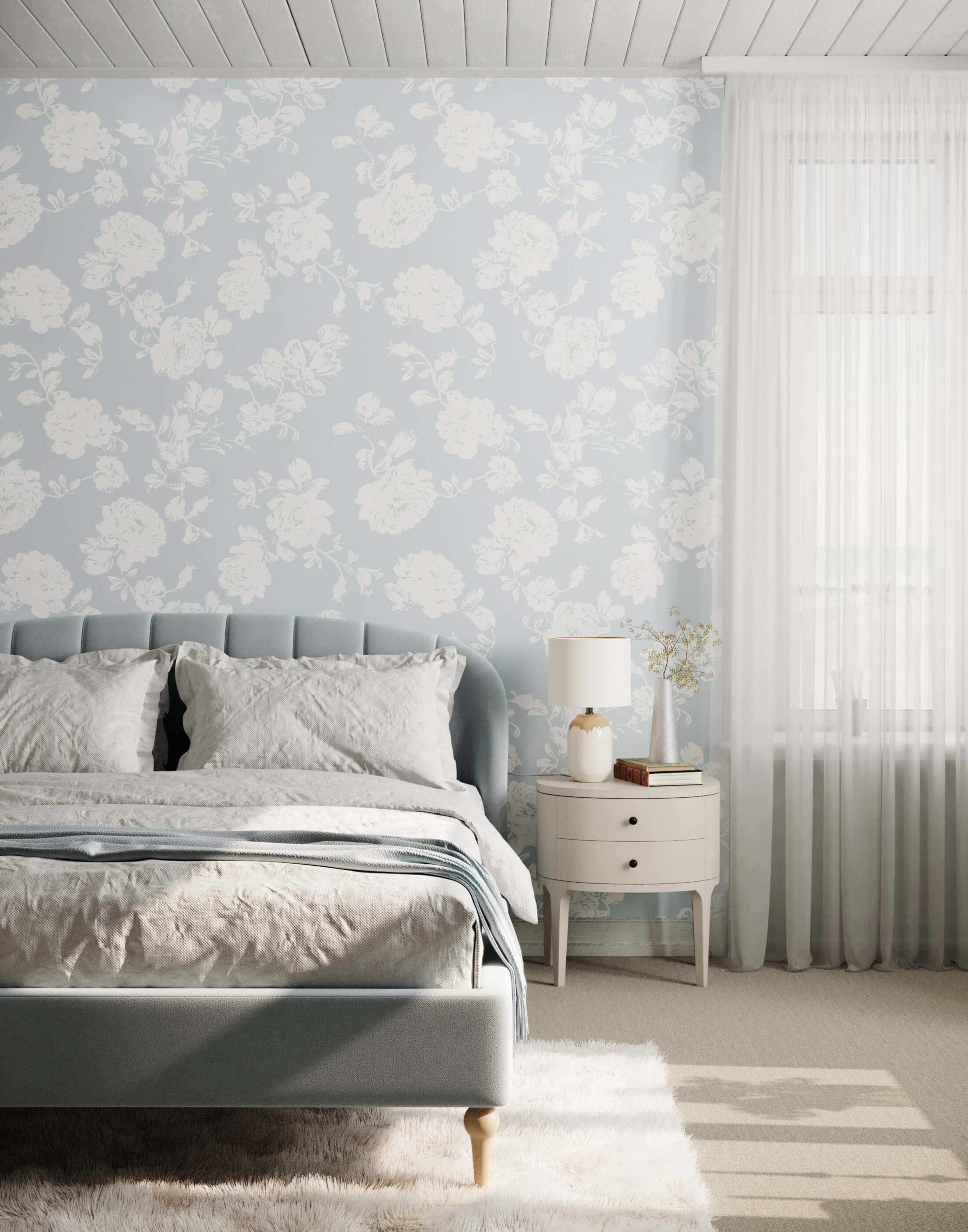 A soft gray upholstered bed cast with a tufted headboard and footboard featuring light wood legs
