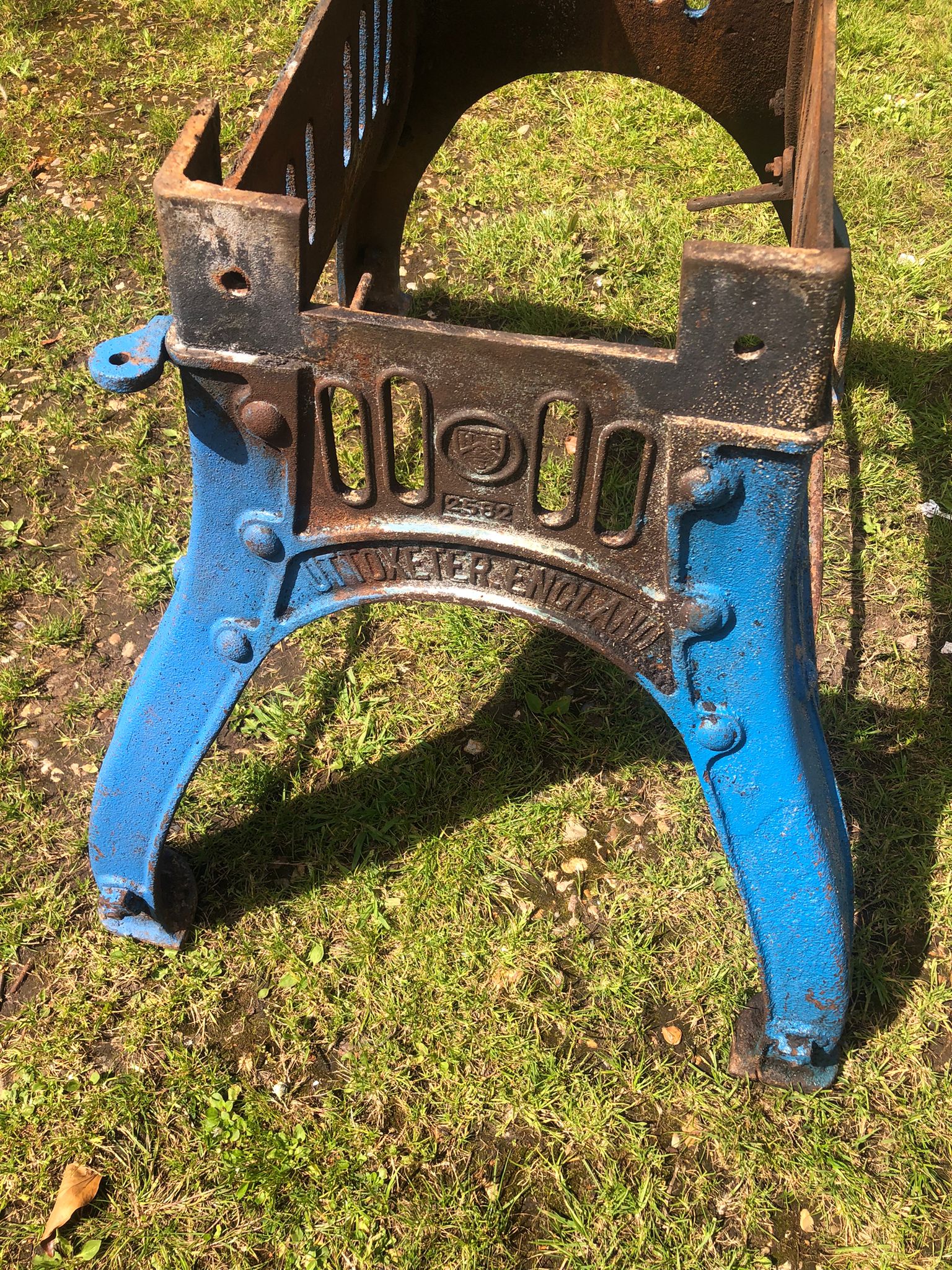 Blue painted cast iron henry bamford table base with rusted accents and engraved birmingham england branding