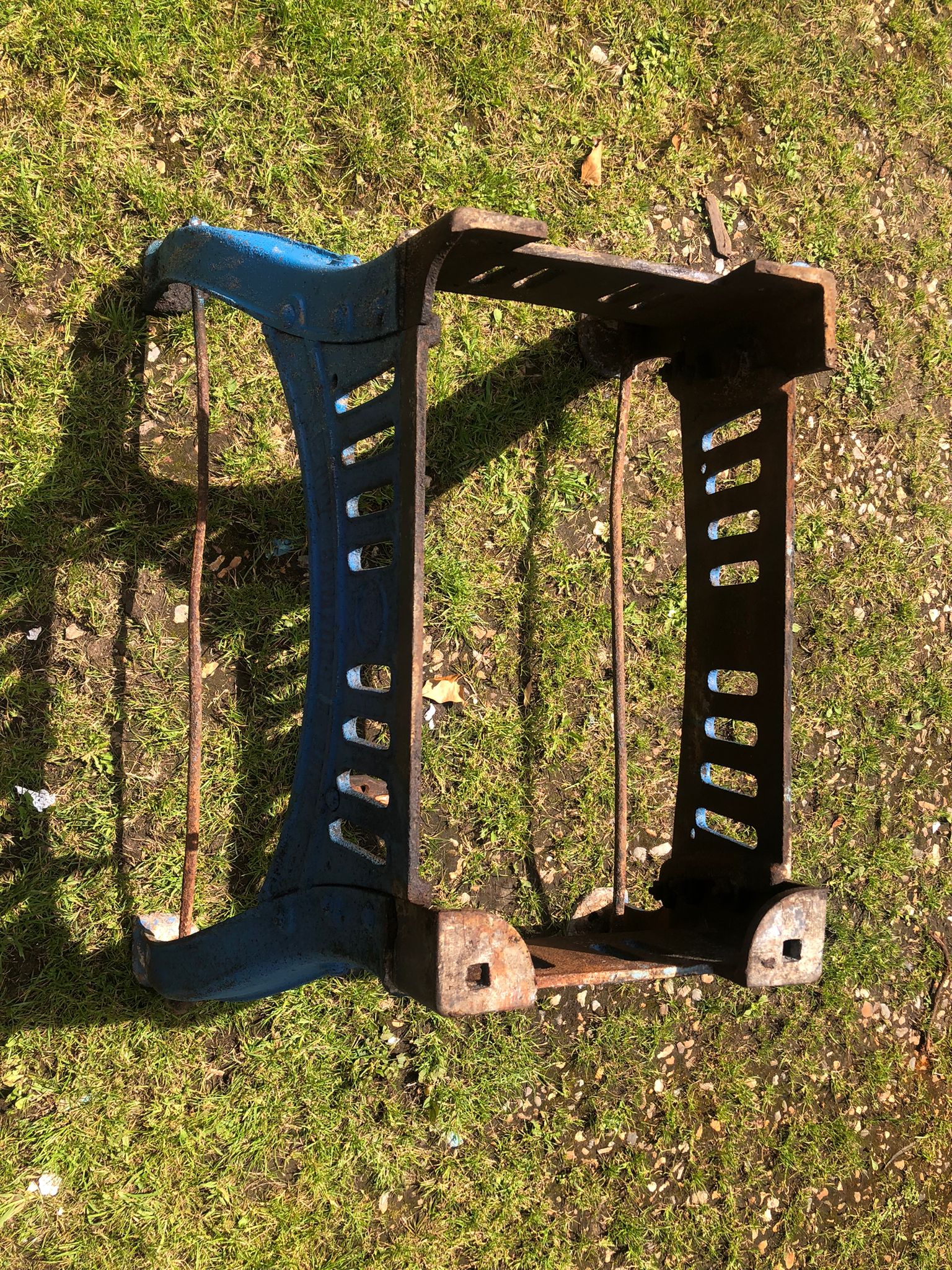 Blue and rusted cast iron table base with slotted design reclaimed original by henry bamford and sons
