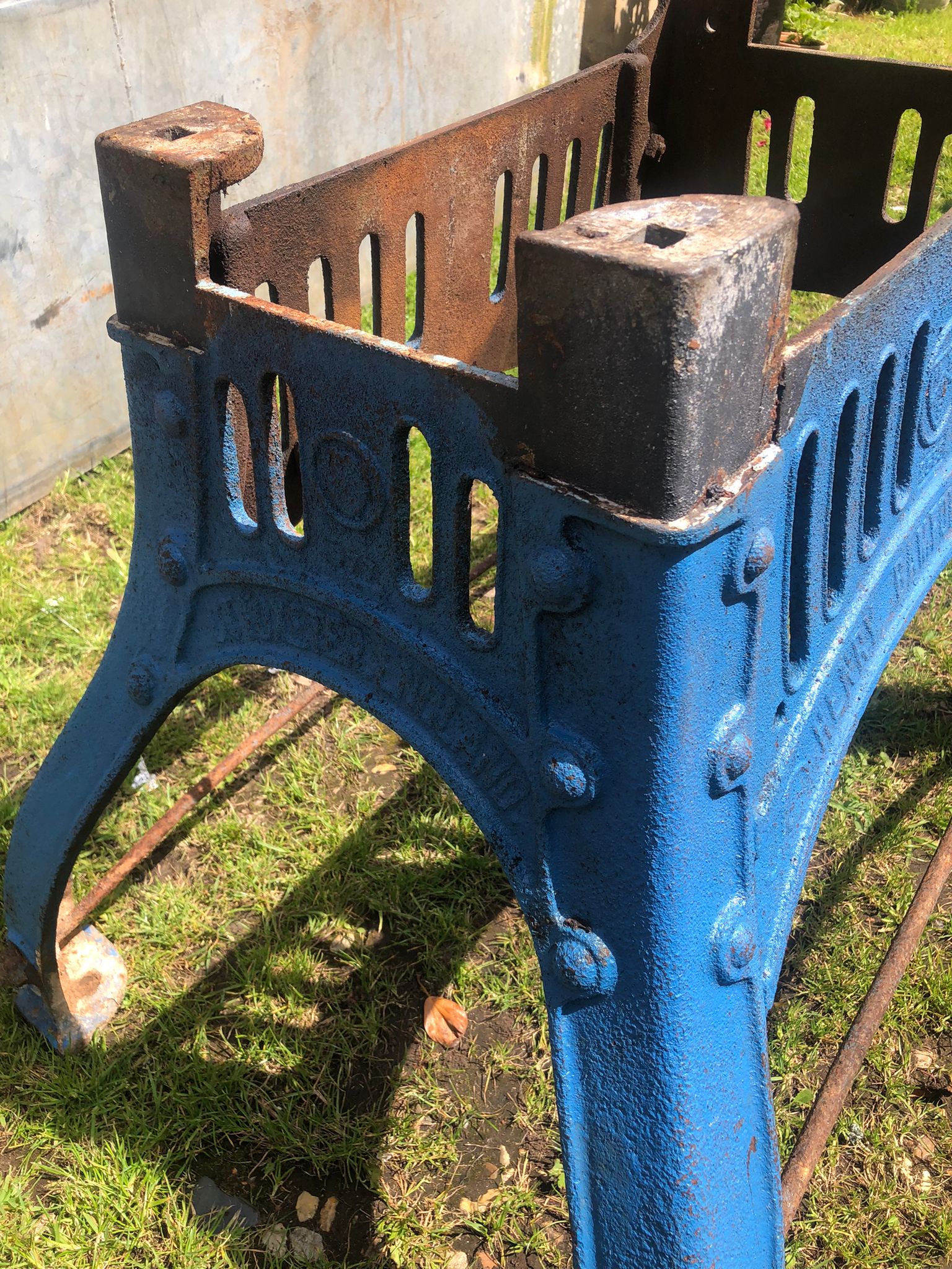 Blue painted cast iron reclaimed original henry bamford and sons industrial table base with rusted metal and vertical slits