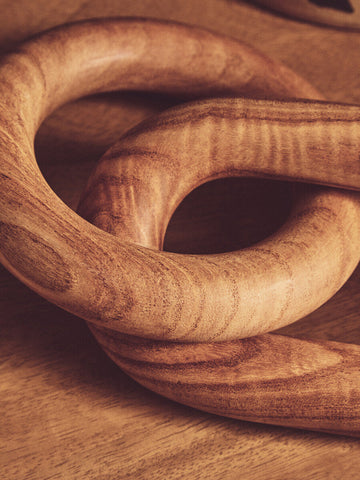 Handcrafted cato natural wood ring with smooth warm finish and visible natural wood grain in link chain decor style