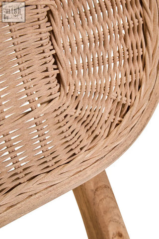 Natural woven rattan dining chair with curved pattern and light brown finish on grey wash elm wood frame