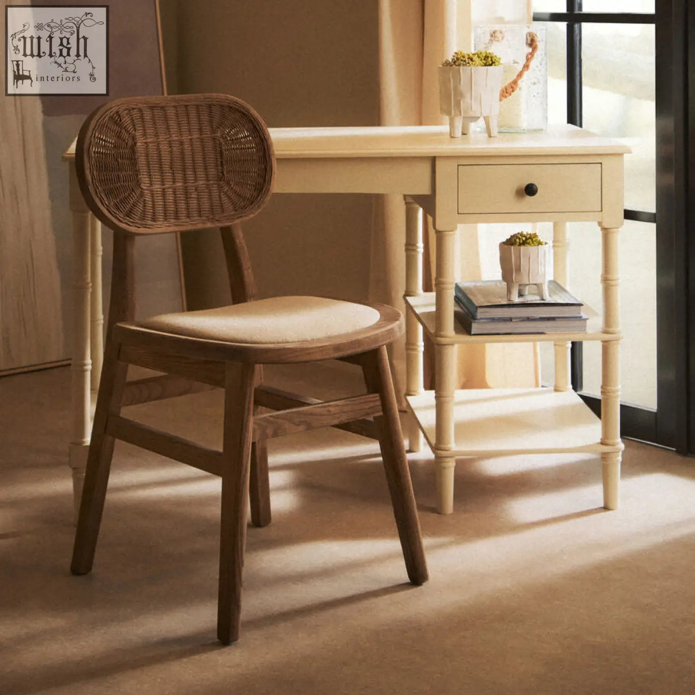 A rustic dining chair with a woven rattan back and beige fabric seat on grey wash elm wood frame