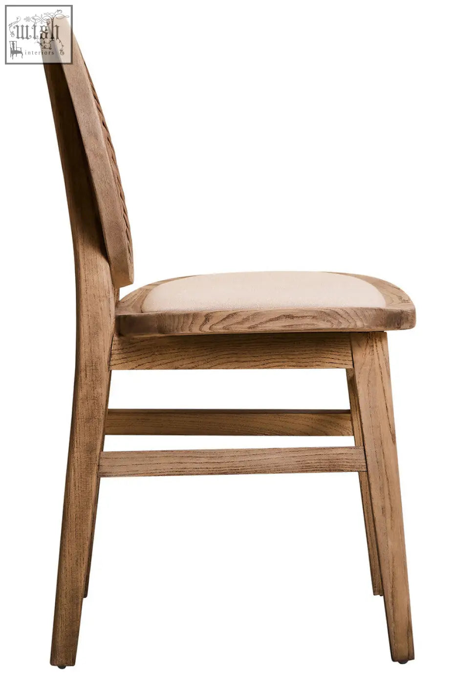 A light oak elm wood dining chair with a white wash finish and beige fabric seat perfect for any dining room