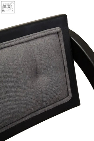 Gray tufted fabric cushion on black elm wood frame of cebu grey and black elm wood folding chair