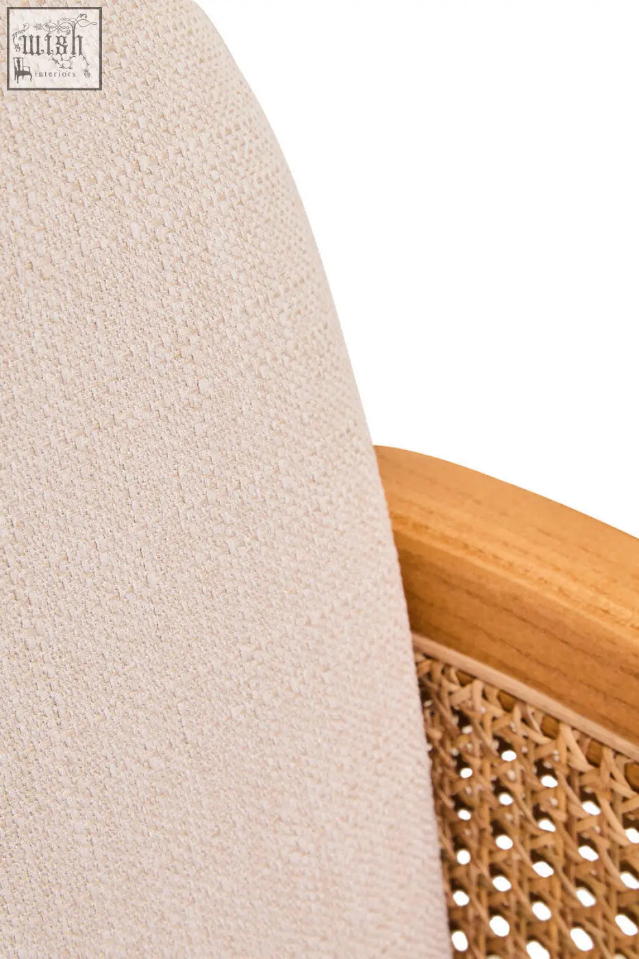 Beige upholstered chair with ivory fabric, woven cane backrest, and elm wood legs for comfortable seating