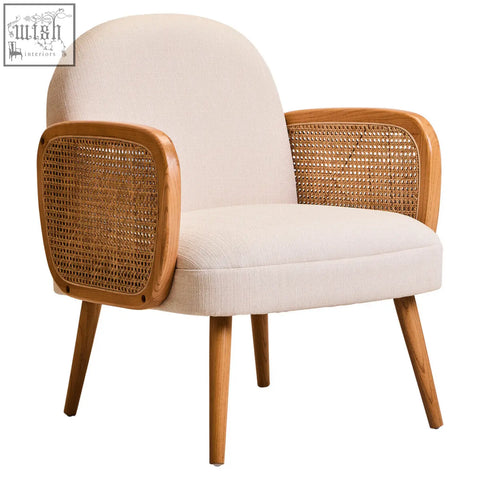 Beige upholstered armchair with ivory fabric, woven cane panels, and elm wood legs for comfortable seating