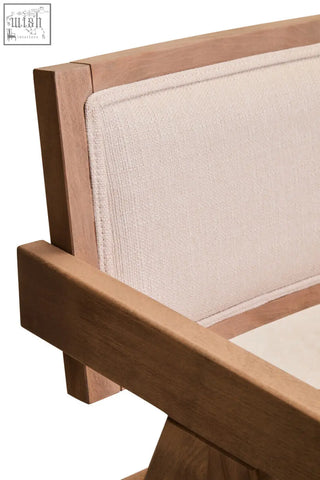 Beige fabric cushioned backrest framed in grey wash beech wood on a cebu ivory fabric and grey wash beech wood dining chair