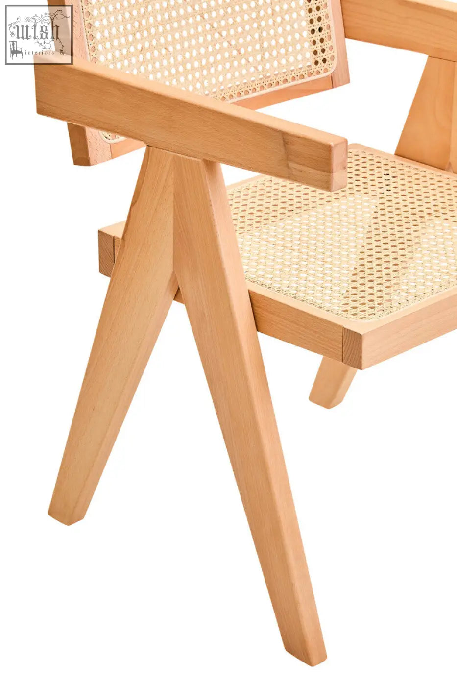 Light-colored wooden dining chair with natural cane woven seat and backrest from cebu natural cane collection