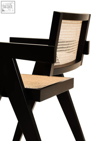 Black-framed dining chair with cebu natural cane woven back and seat and black beech wood frame