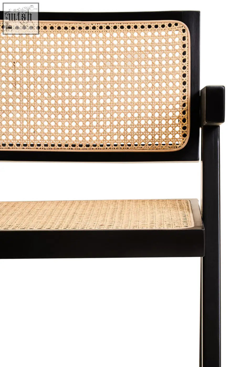 Black-framed dining chair with cebu natural cane woven seat and backrest in natural tones