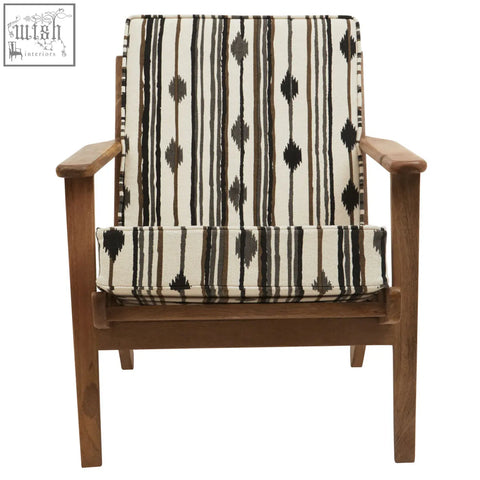 Cefena armchair with angular arms features a wooden frame and cream black brown striped upholstery with white weave accents