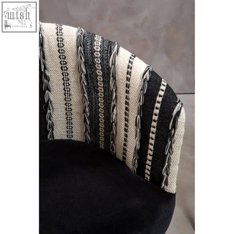 Back side of cefena black and white chair with black and white striped woven fabric on mango wood frame adds depth