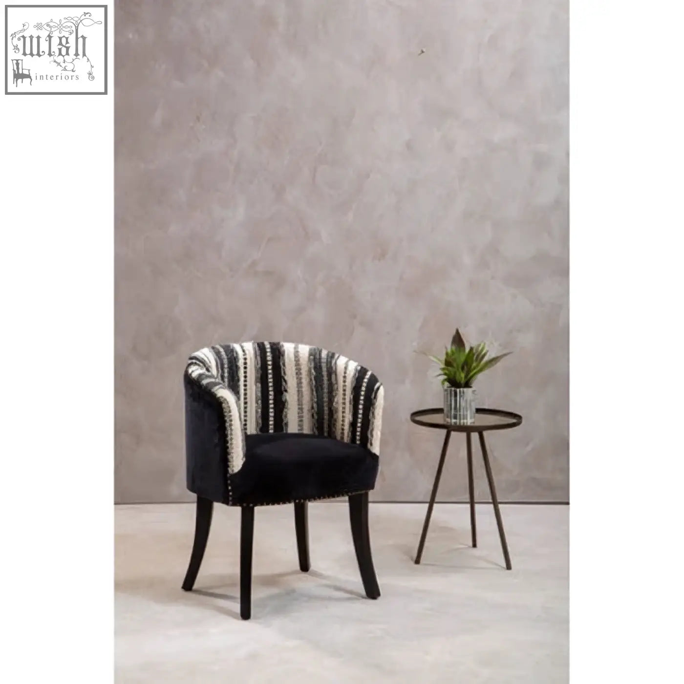 Black upholstered cefena chair with white striped backrest nailhead trim and mango wood legs adds depth to any room
