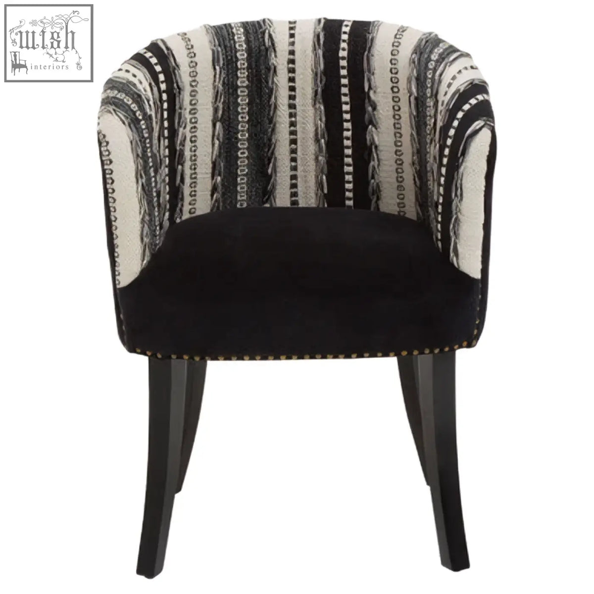 Cefena black and white chair with black velvet armrest, white striped fabric, and mango wood legs adds depth to any space