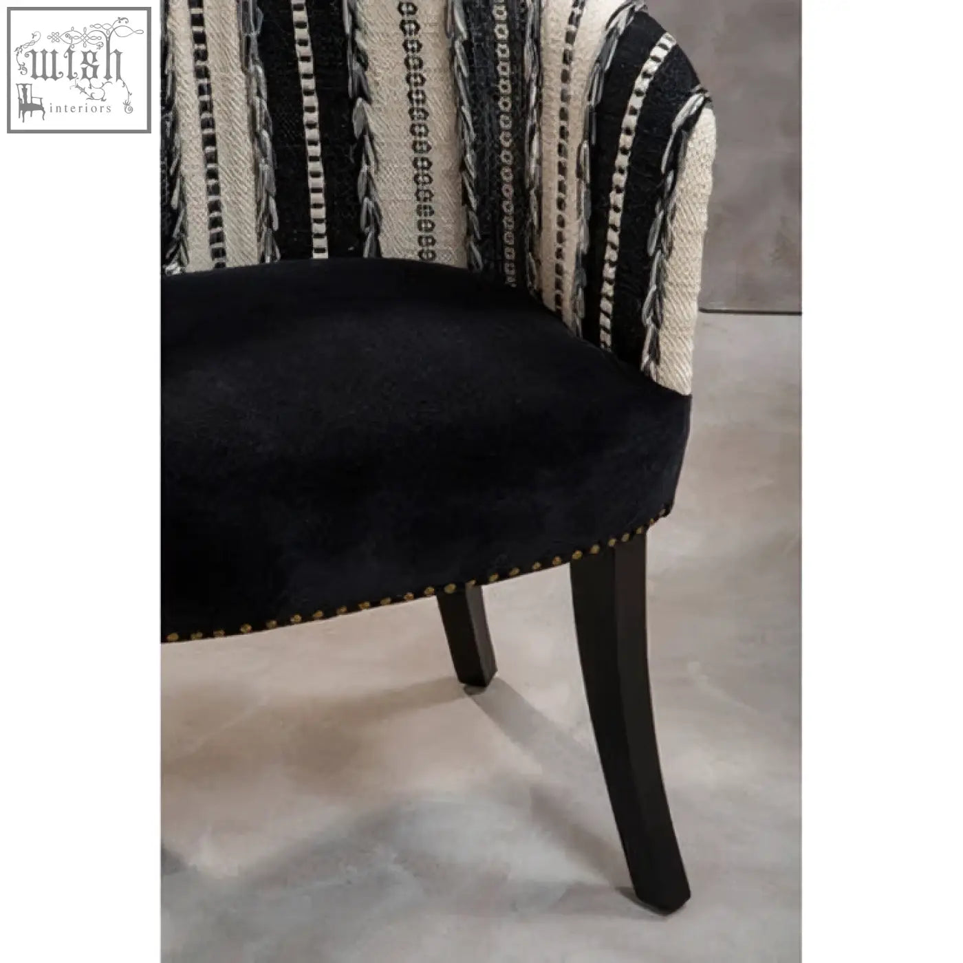 Cefena black and white chair with black velvet and white chair striped fabric adds depth with mango wood legs and nailhead trim