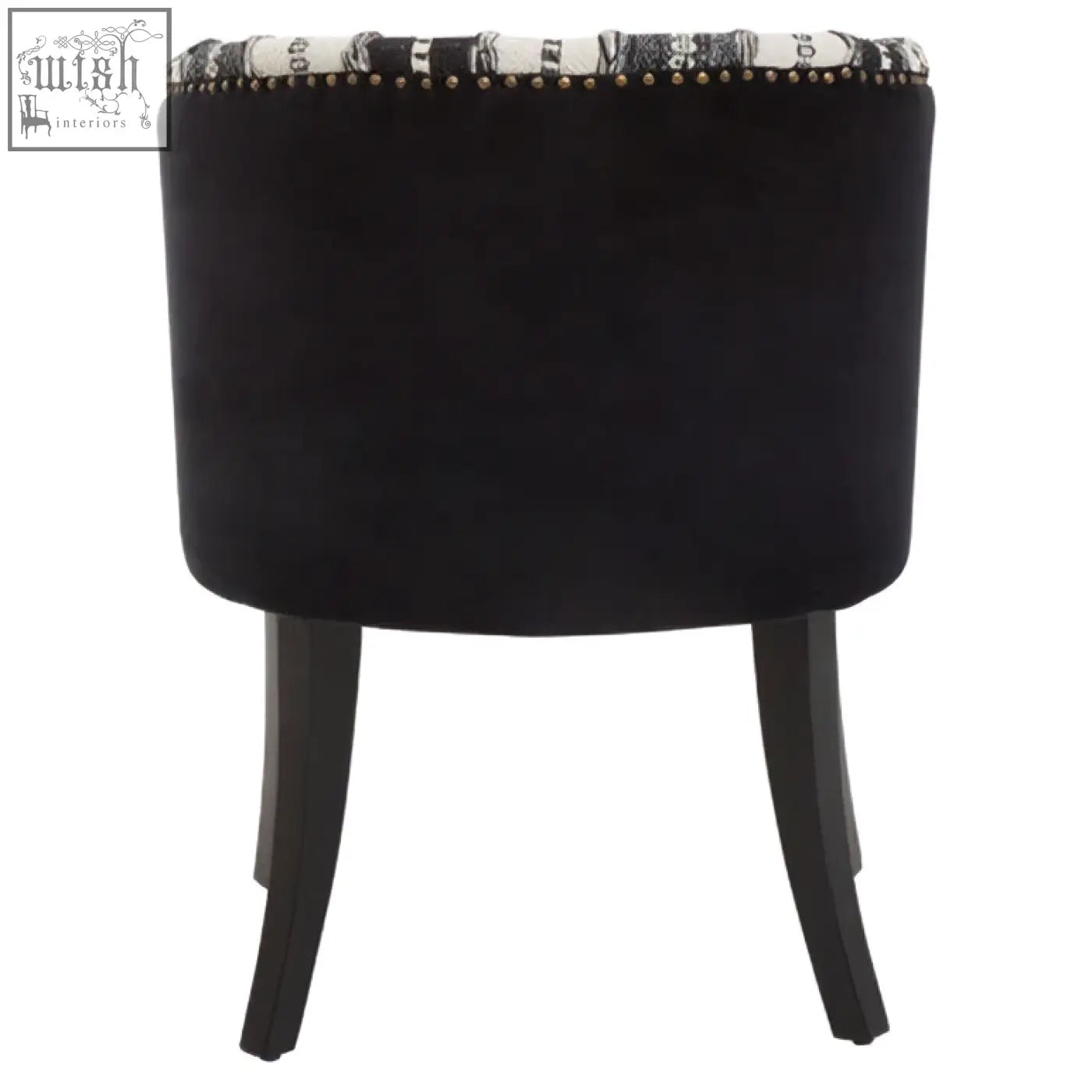 Black velvet stool with decorative patterned trim and studded edge adds depth to the cefena black and white chair