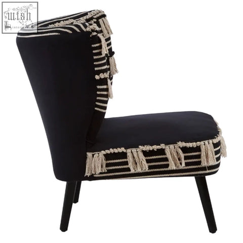 Cefena black moroccan chair with black upholstery cream macrame fringe and striped detailing on backrest and seat