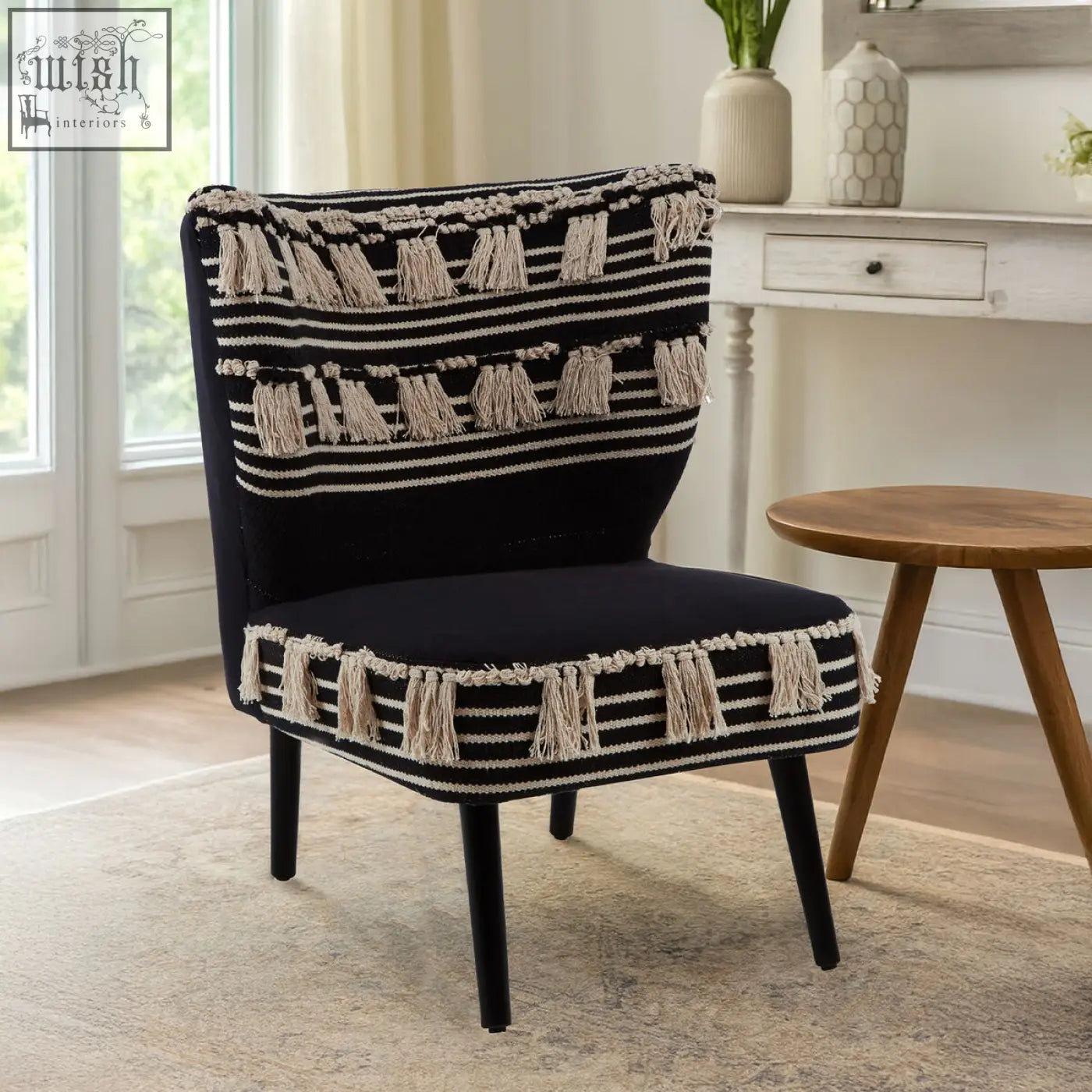 Cefena black moroccan chair with black upholstery white stripes and cream tassels on backrest seat and sides