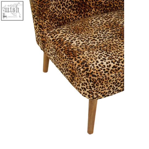 Cefena leopard print velvet armchair with wooden legs and soft velvet upholstery