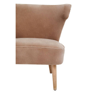Tan suede armchair with light wood legs featuring the cefena mink velvet and natural linen chair design