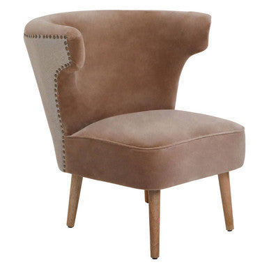Tan velvet armchair with wooden legs and decorative nailhead trim in cefena mink velvet and natural linen chair style