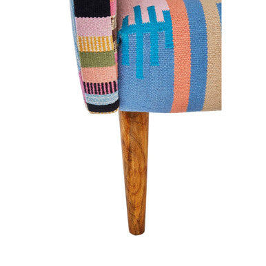 A cefena multi coloured fabric chair with colorful striped upholstery and warm mango wood legs