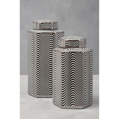 Two hexagonal small ceramic jars with black and white wavy patterned fitted lids in the celeste style
