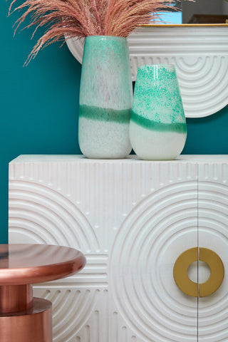 Two ceramic vases with speckled glaze in large turquoise and white ombre featuring a white ombre vase design