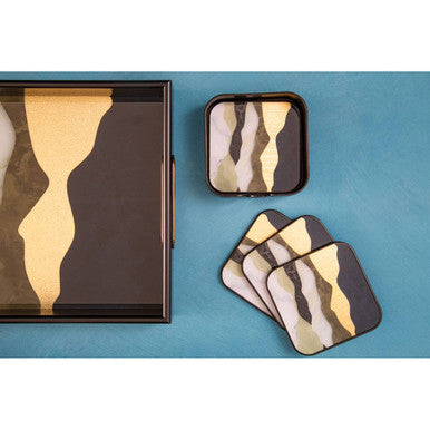 Black and gold abstract wave-patterned square coasters and serving tray from the celina set of four square coasters