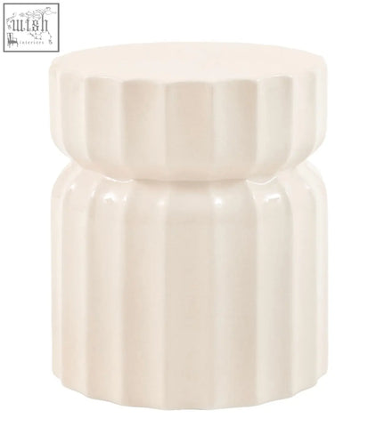 Cream-colored ceramic celino side table with modern ridge pattern and fluted segmented design for modern decor