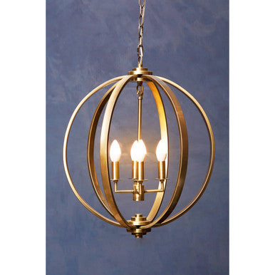 Brass spherical antique brass pendant light with three lit candle-style bulbs perfect for vintage decor