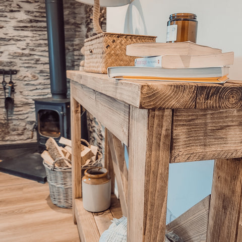 Rustic wooden cera console table with v back design featuring natural wood finish and visible grain texture